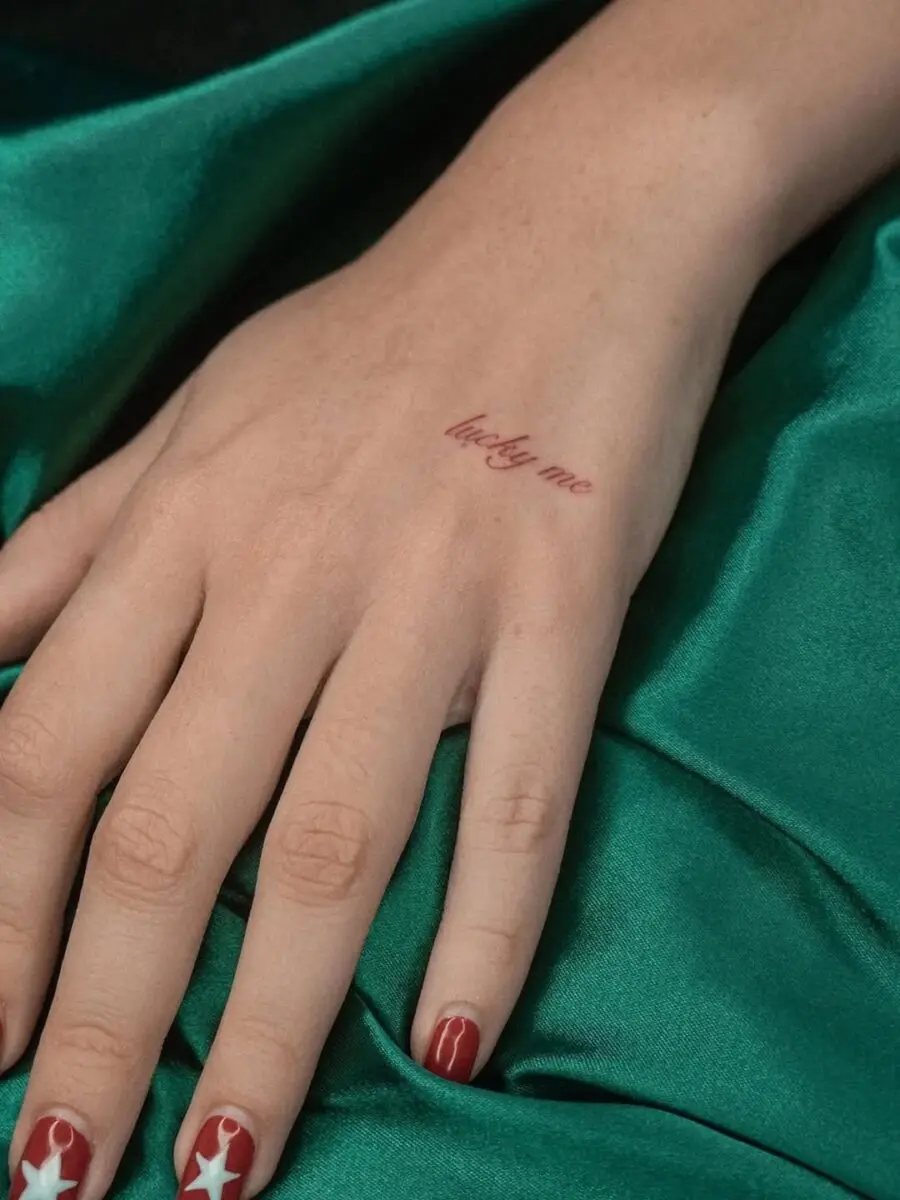 Delicate 'Lucky Me' Hand Tattoo Design