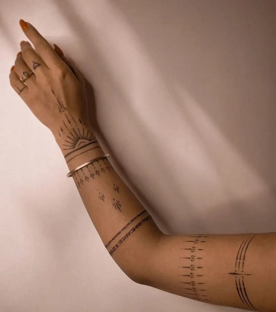 Elegant Mindfulness Tattoos on Arm