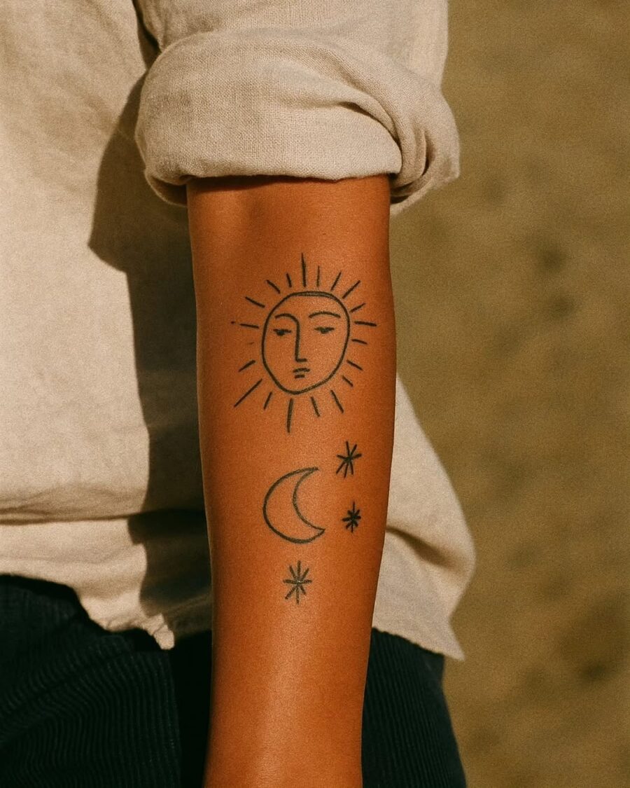 A serene sun and moon tattoo design