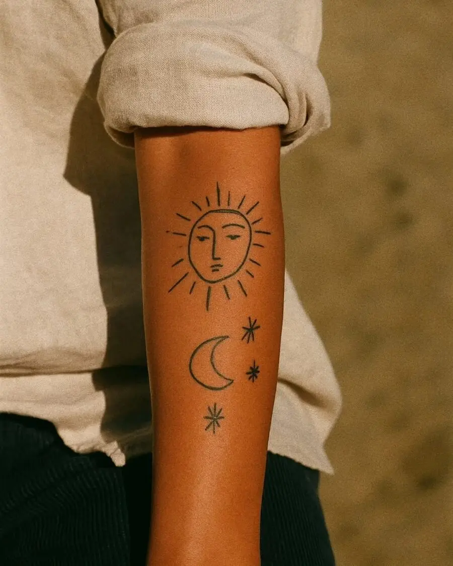 A serene sun and moon tattoo design