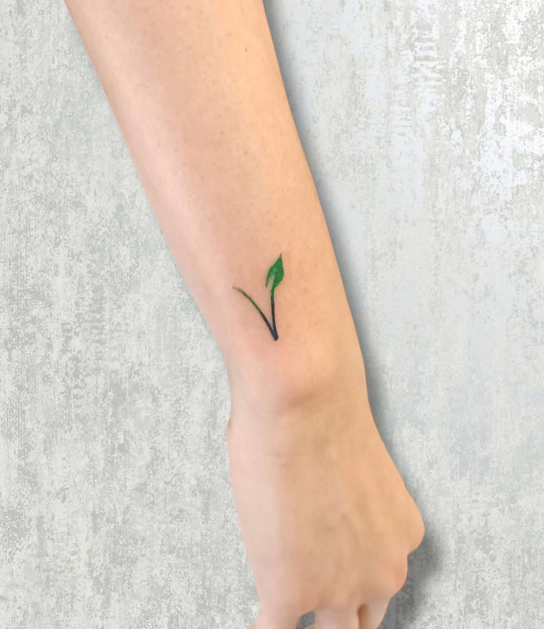 Delicate Leaf Tattoo Symbolizing Vegan Values
