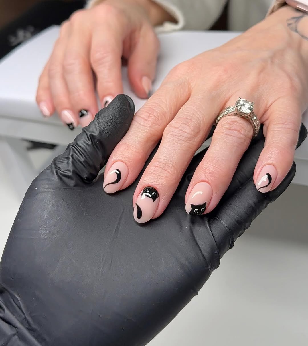 Chic office nails with playful cat designs