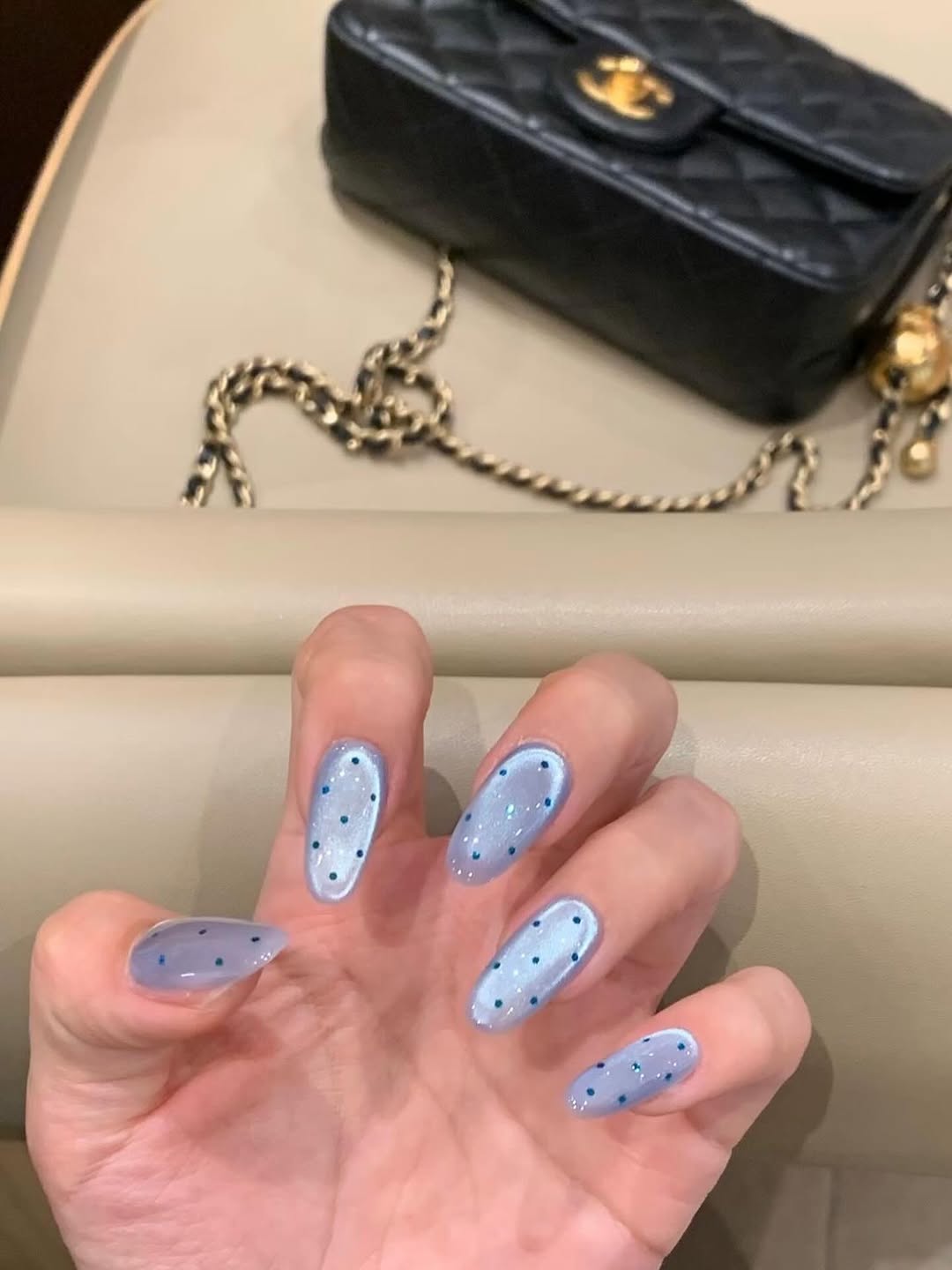 Chic blue glitter nails perfect for office style