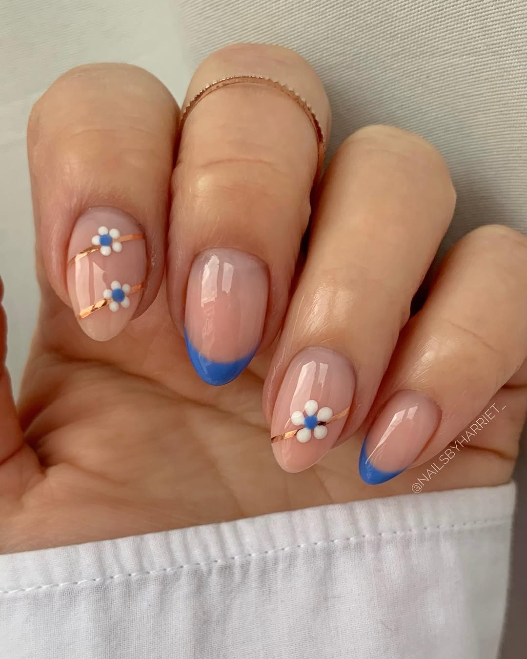 Chic blue-tipped floral office nails