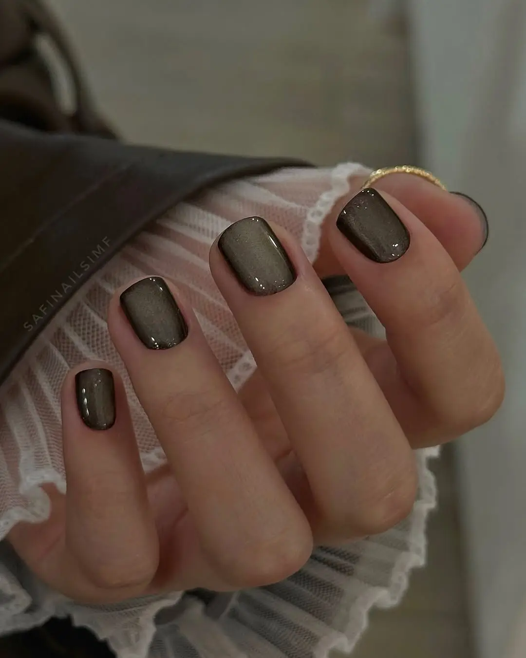 Stylish dark glossy office nails for sophistication