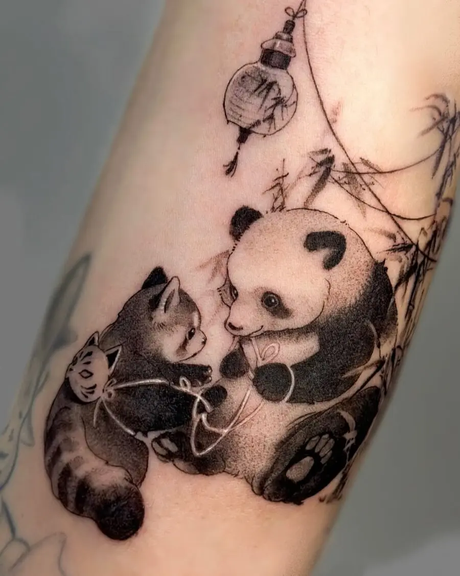 Whimsical panda and kitten tattoo design