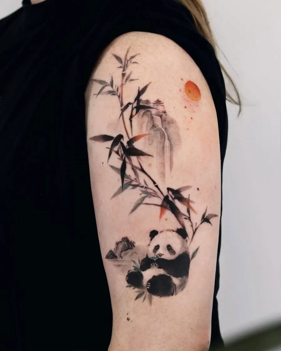 Artistic panda tattoo with bamboo elements