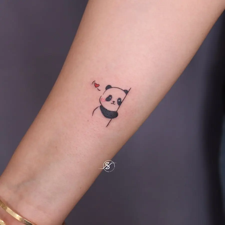 Adorable minimalist panda tattoo with heart detail