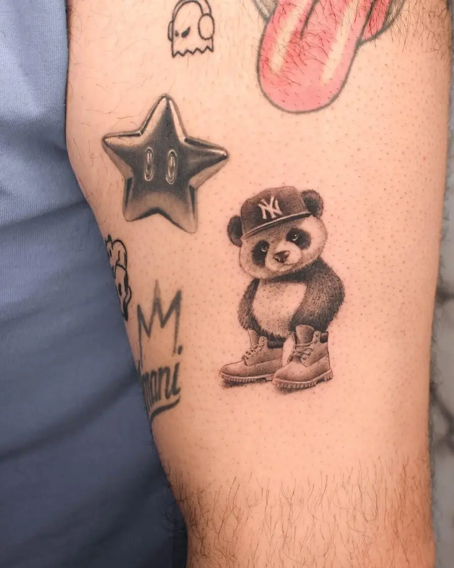 Unique panda tattoo with stylish sneakers and cap