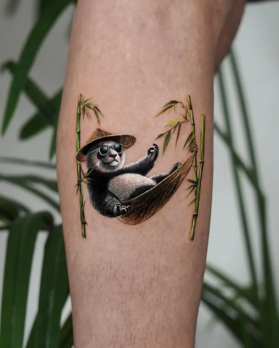 Charming panda tattoo enjoying leisure time