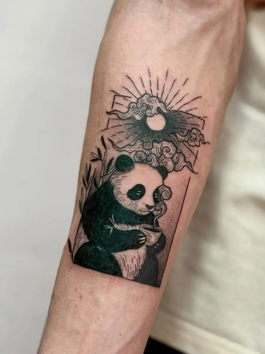 Charming panda tattoo with serene elements