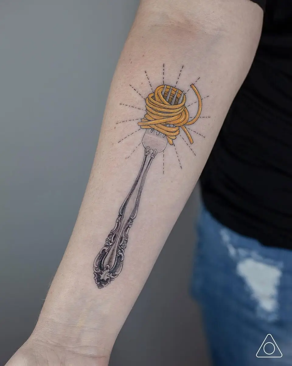Elegant fork entwined with vibrant spaghetti tattoo