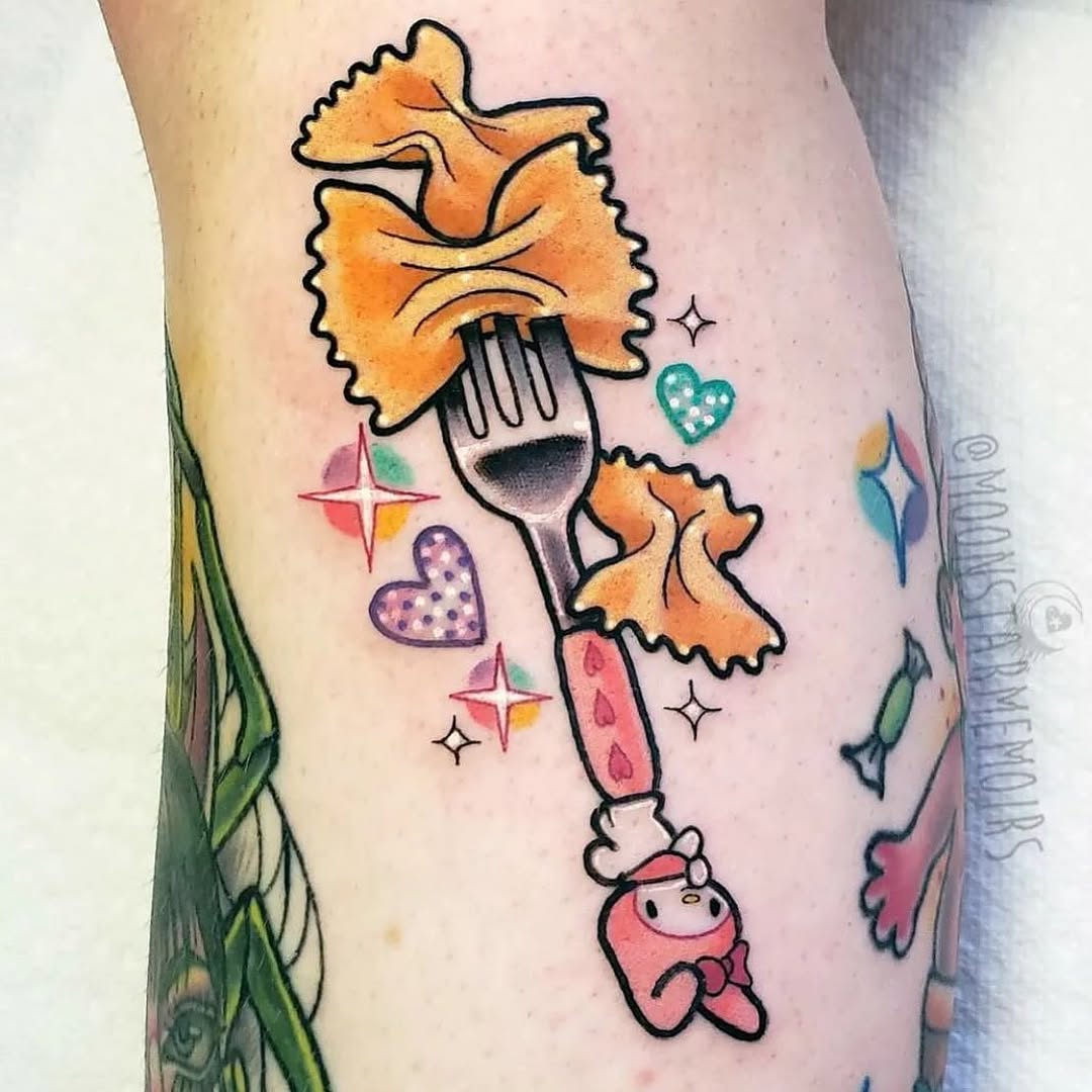 Charming pasta fork tattoo with vibrant colors