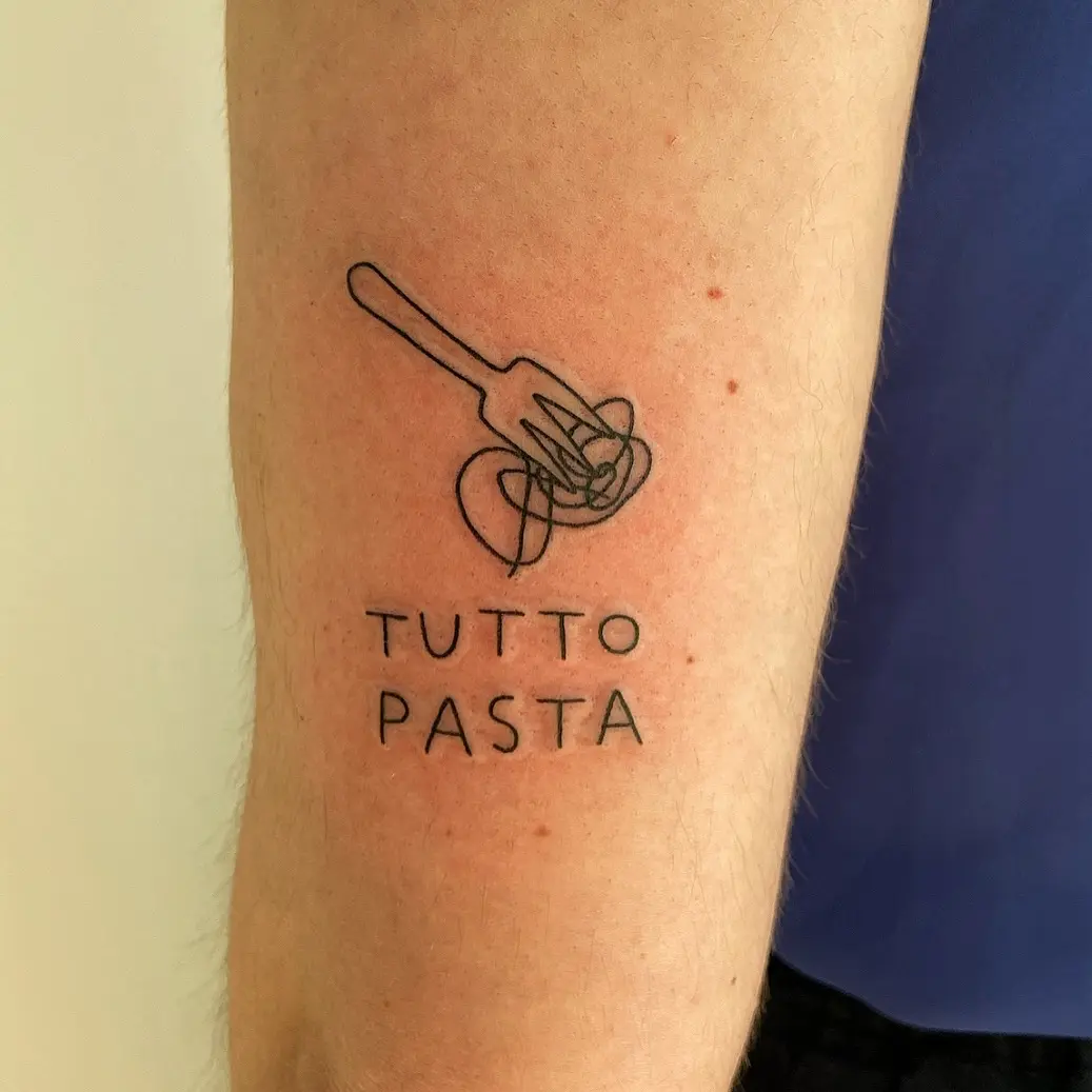 Whimsical fork and spaghetti tattoo design