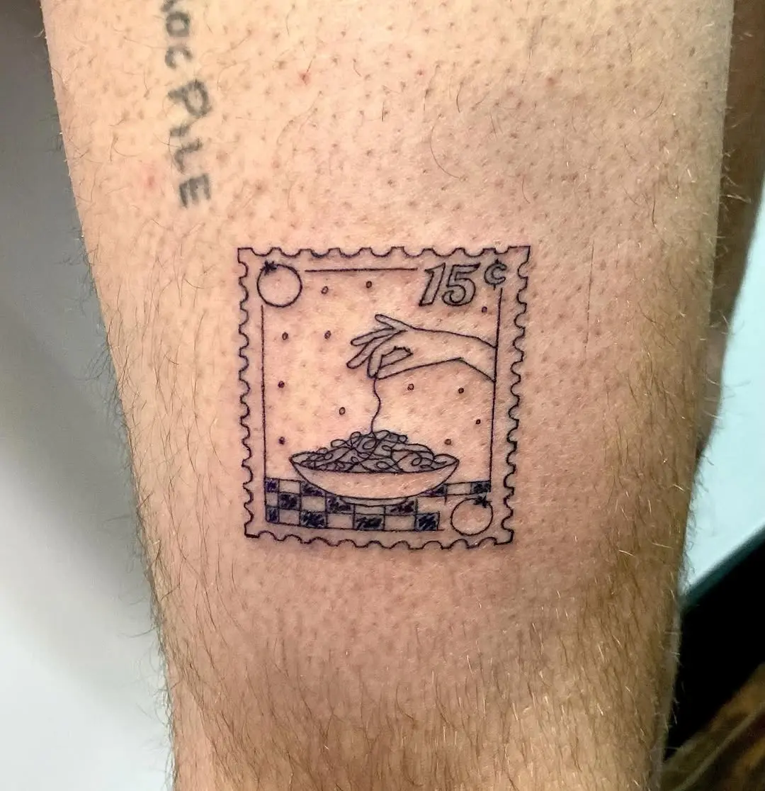 Whimsical pasta-themed tattoo in stamp design