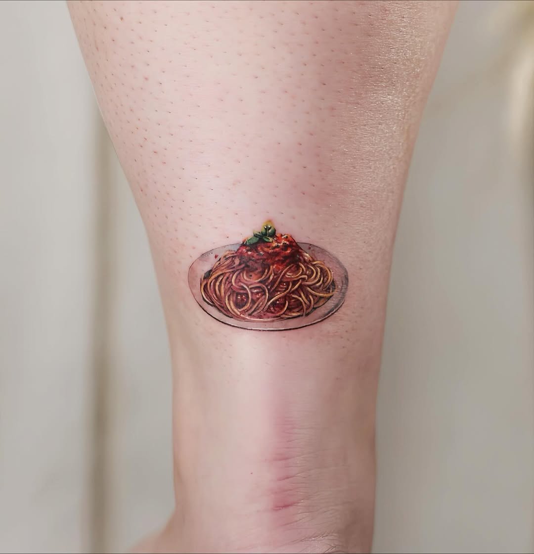 Realistic Spaghetti Tattoo on Ankle