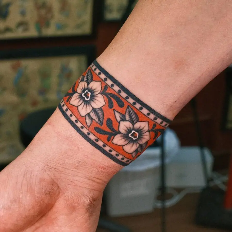 Vibrant floral peace tattoo on wrist