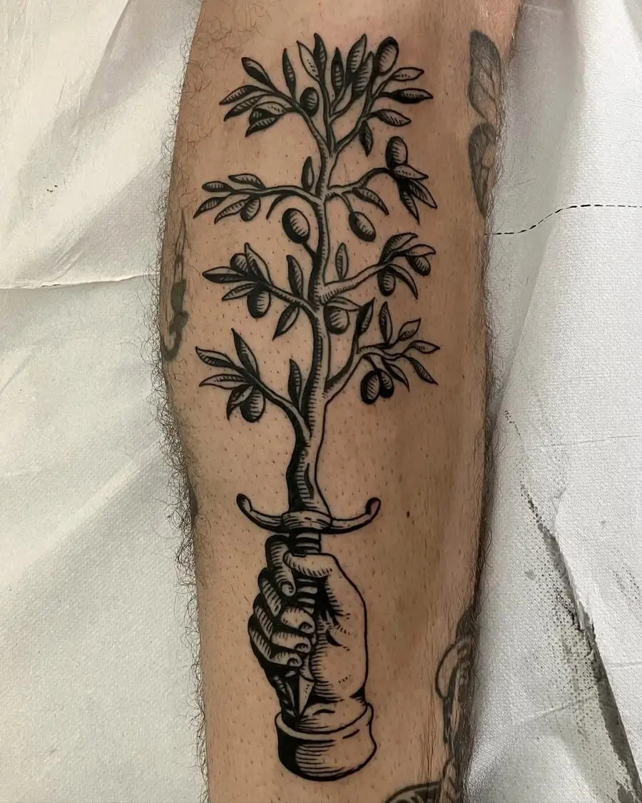 Symbolic olive branch peace tattoo design