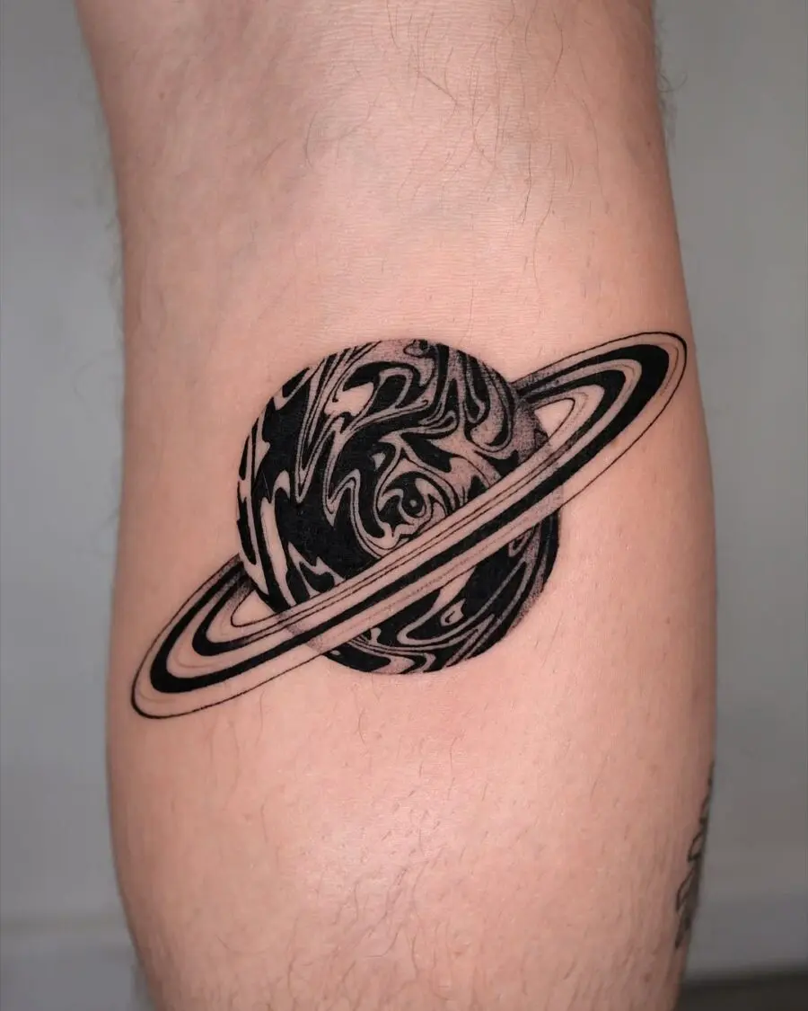 Unique Saturn tattoo symbolizing peace and harmony