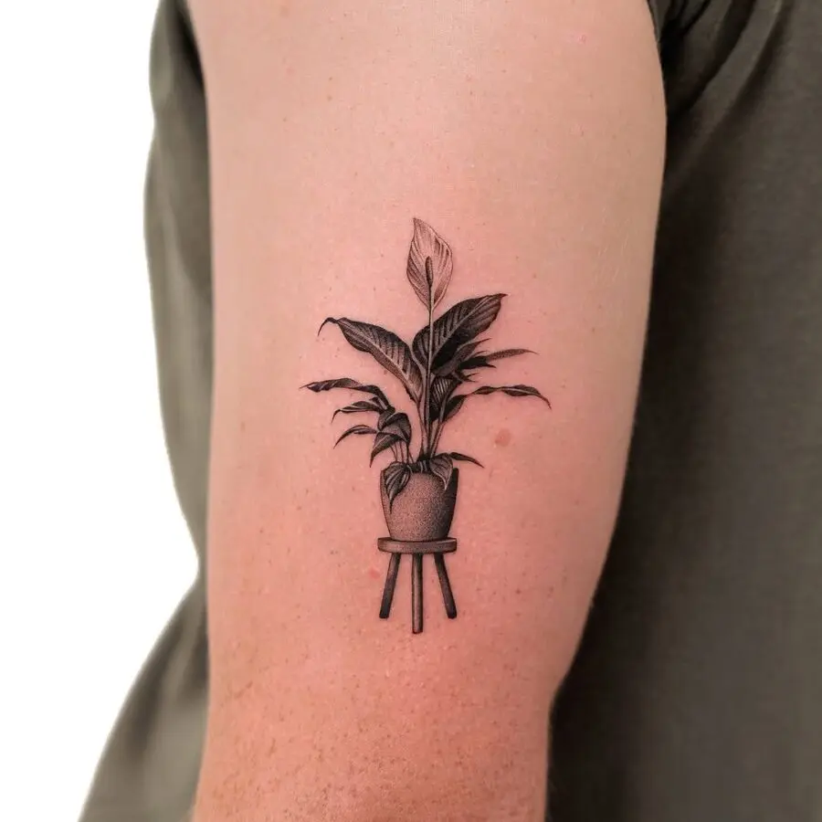 Stylish potted plant tattoo symbolizing peace