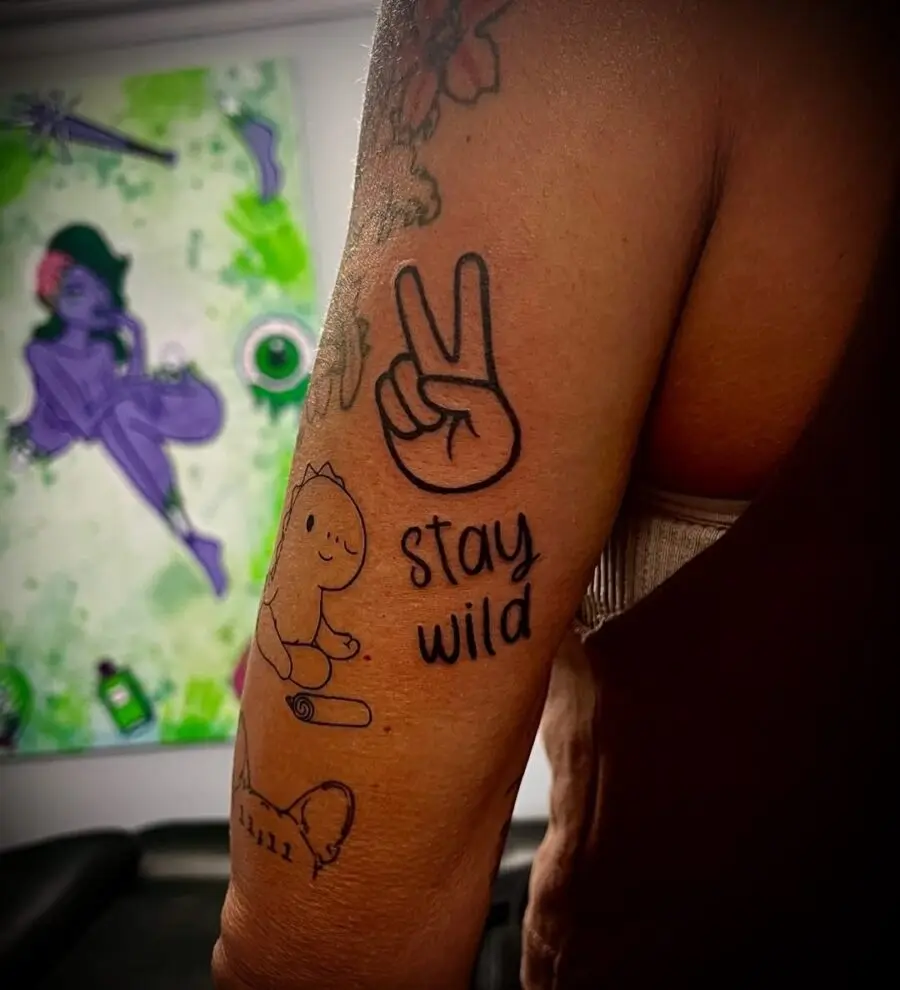 Celebrate individuality with playful peace tattoos