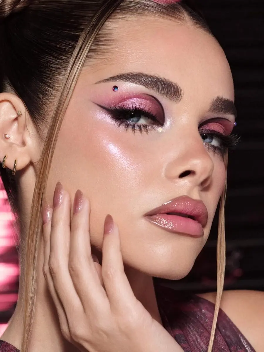 Vibrant pink eyeshadow with dazzling accents