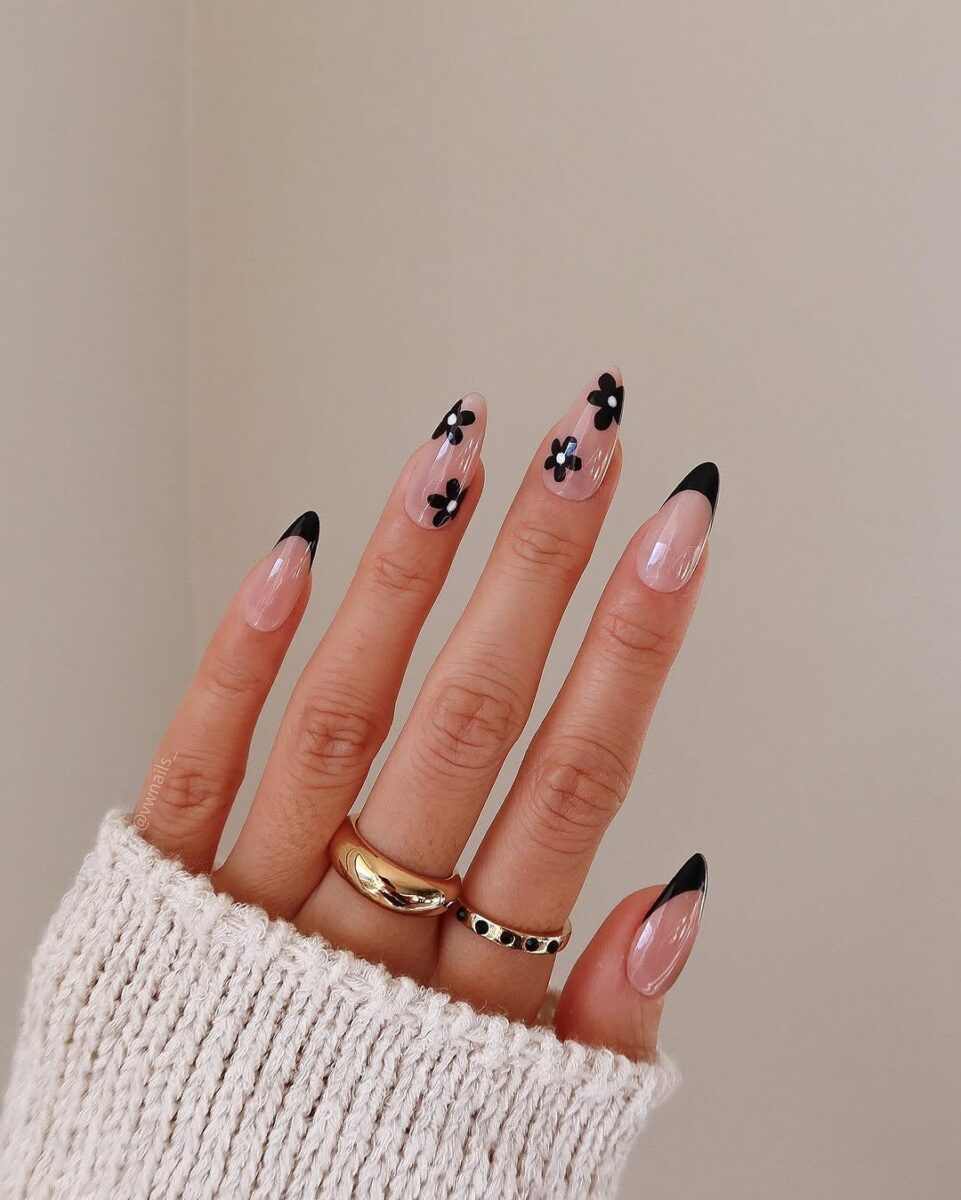 Stylish floral nails with chic black tips