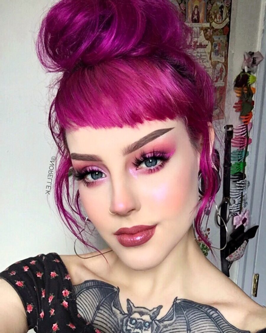 Vibrant pink eyeshadow with striking bold lips