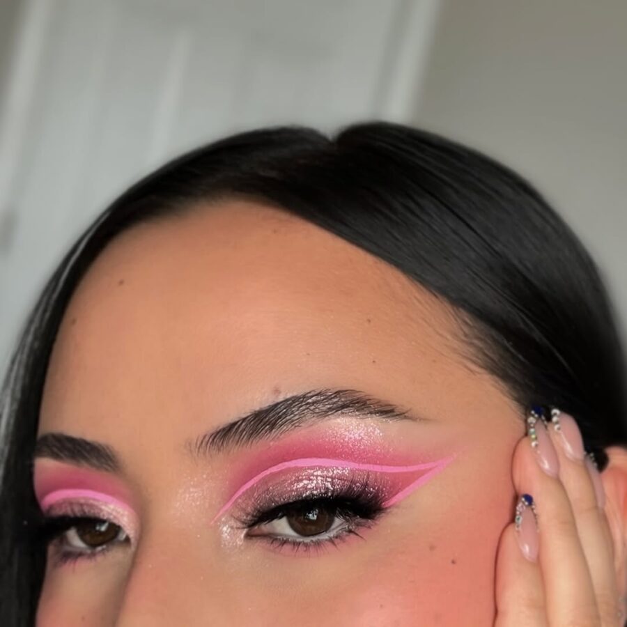 Vibrant Pink Eyeshadow with Bold Cat-Eye.