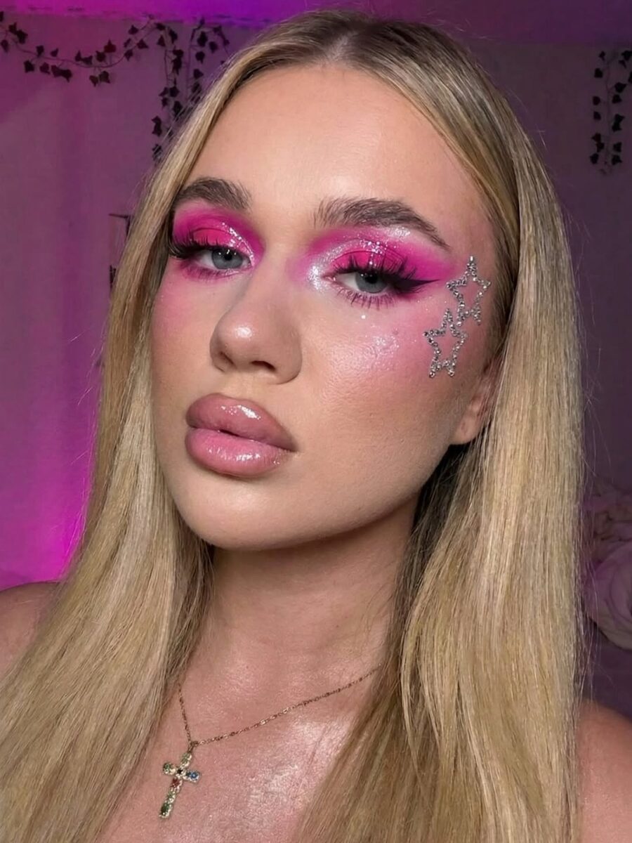 Vibrant pink eyeshadow with star embellishments