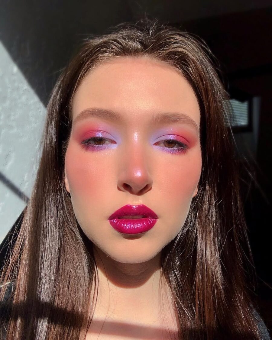Vibrant pink eyeshadow with glossy lips