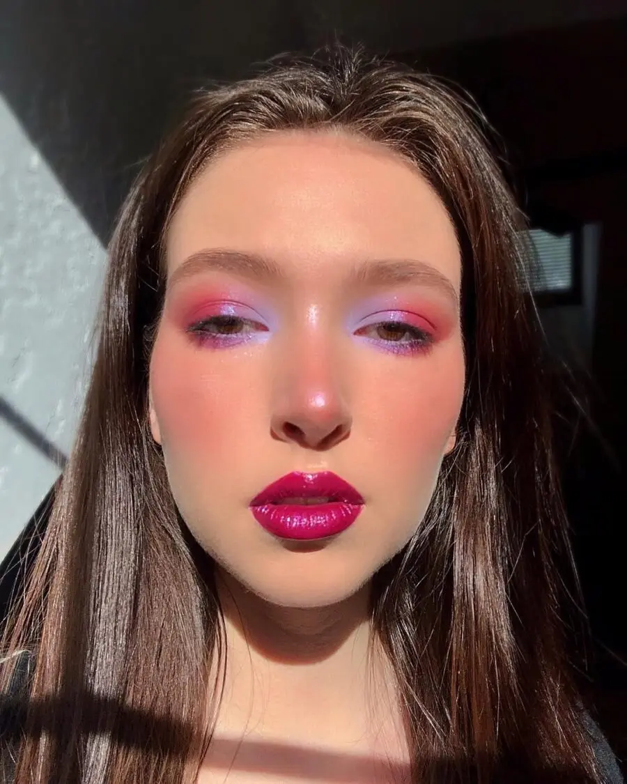 Vibrant pink eyeshadow with glossy lips