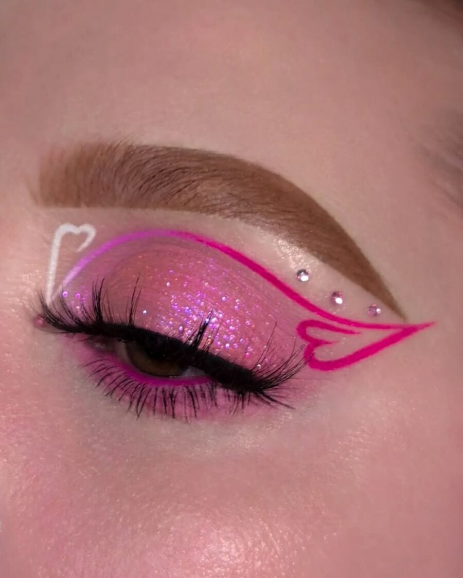 Heart-inspired pink eyeshadow with sparkly accent