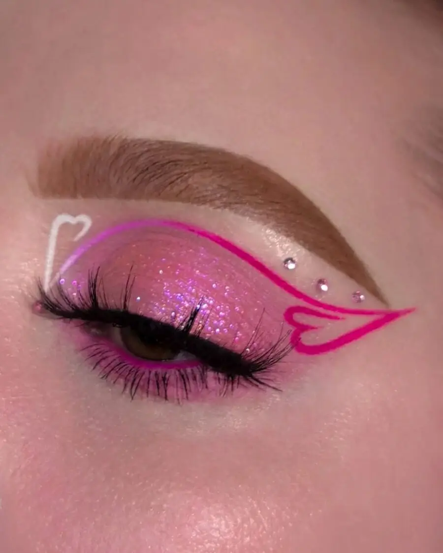 Heart-inspired pink eyeshadow with sparkly accent
