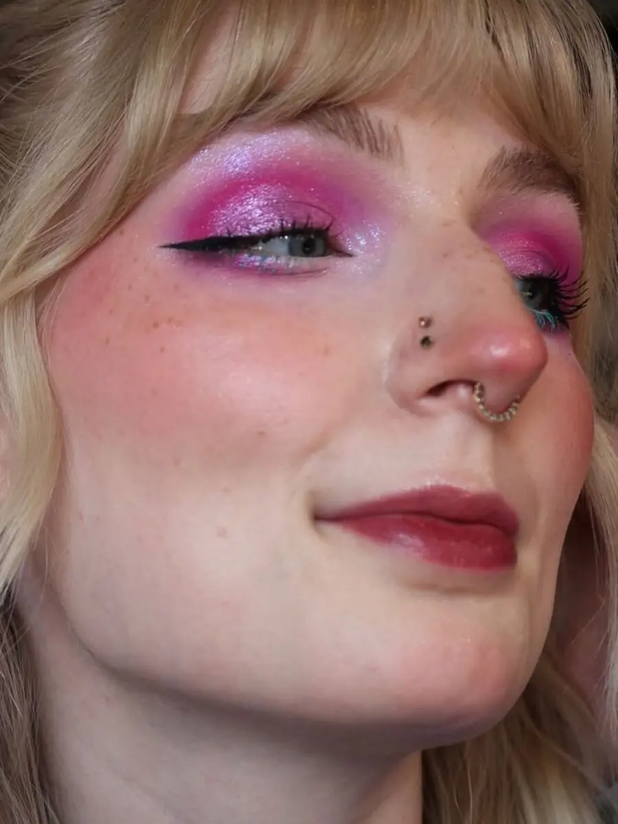 Vibrant pink eyeshadow with sparkling accents