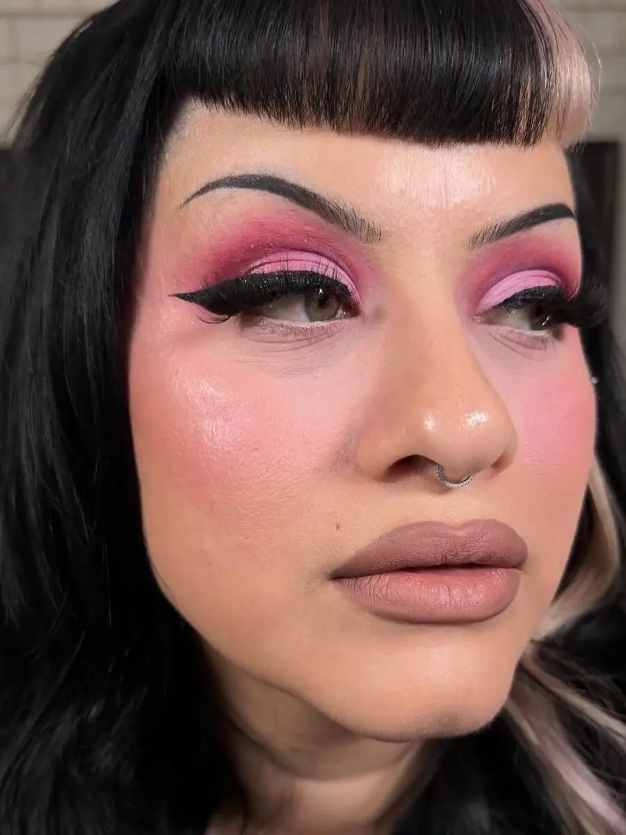 Vibrant pink eyeshadow with soft glam vibes