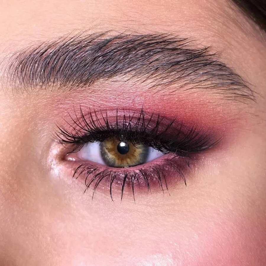 Elegant pink eyeshadow with defined lashes