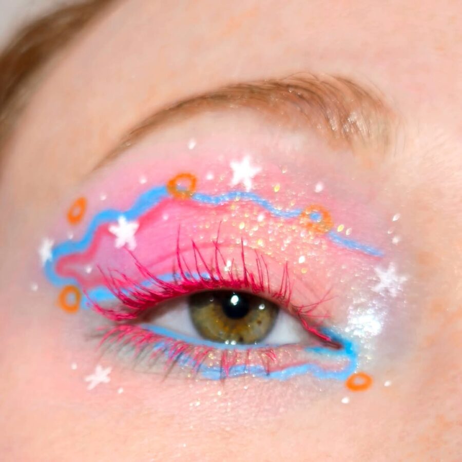 Whimsical pink eyeshadow with playful designs
