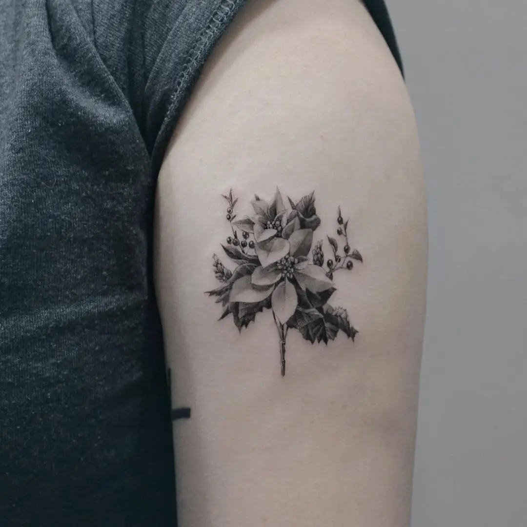 Elegant black and gray poinsettia tattoo design