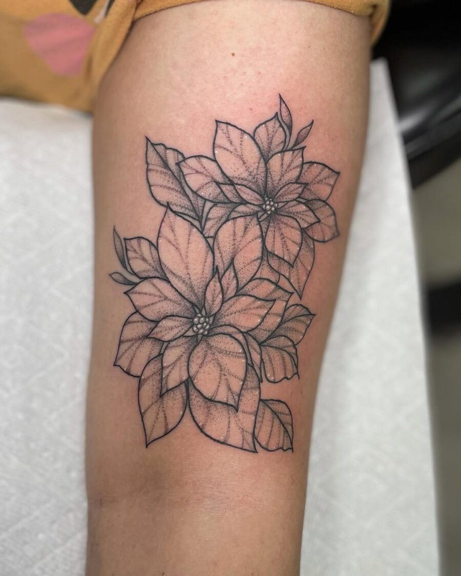Elegant Black Ink Poinsettia Tattoo Design