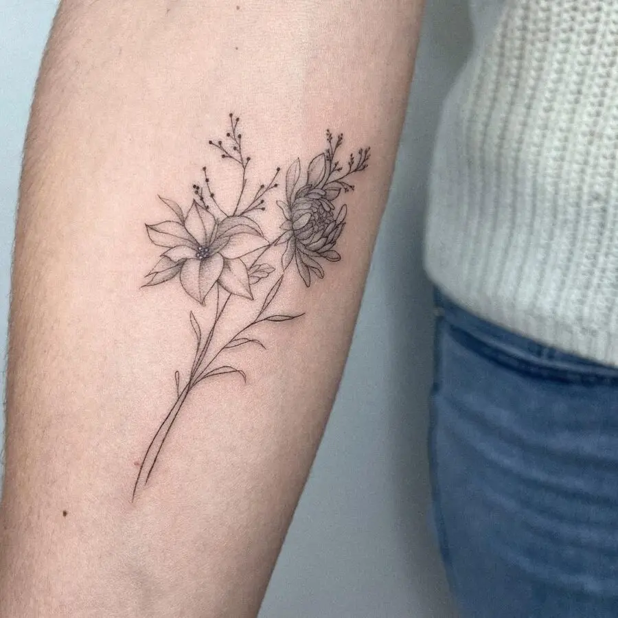 Elegant Black Line Art Poinsettia Tattoo