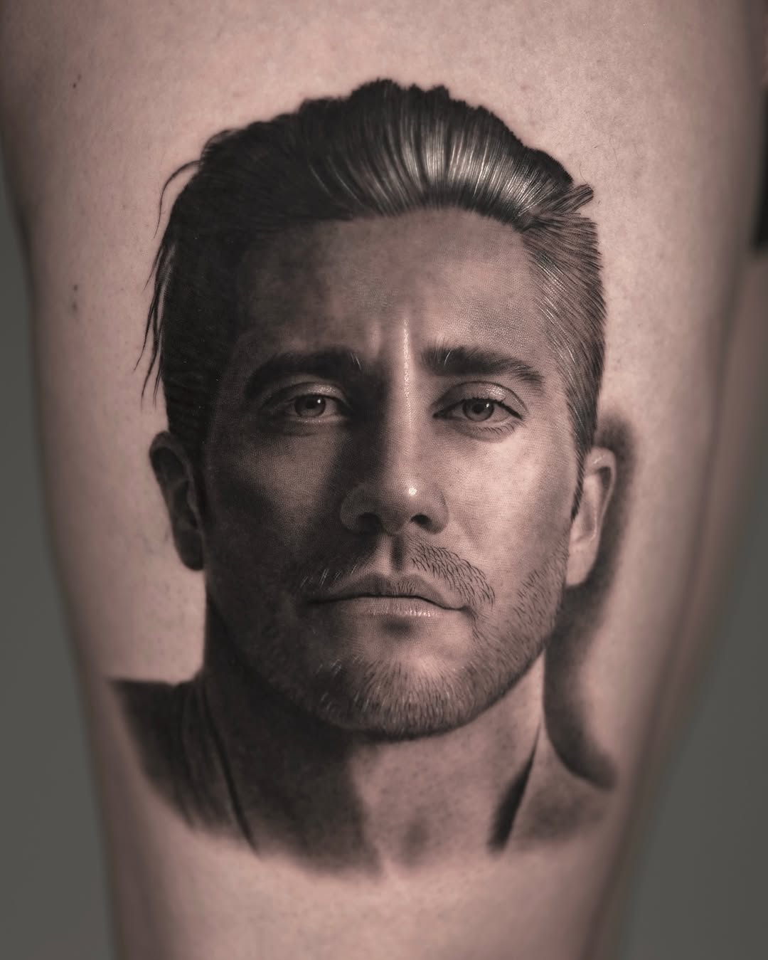 Stunning realistic tattoo portrait of a man