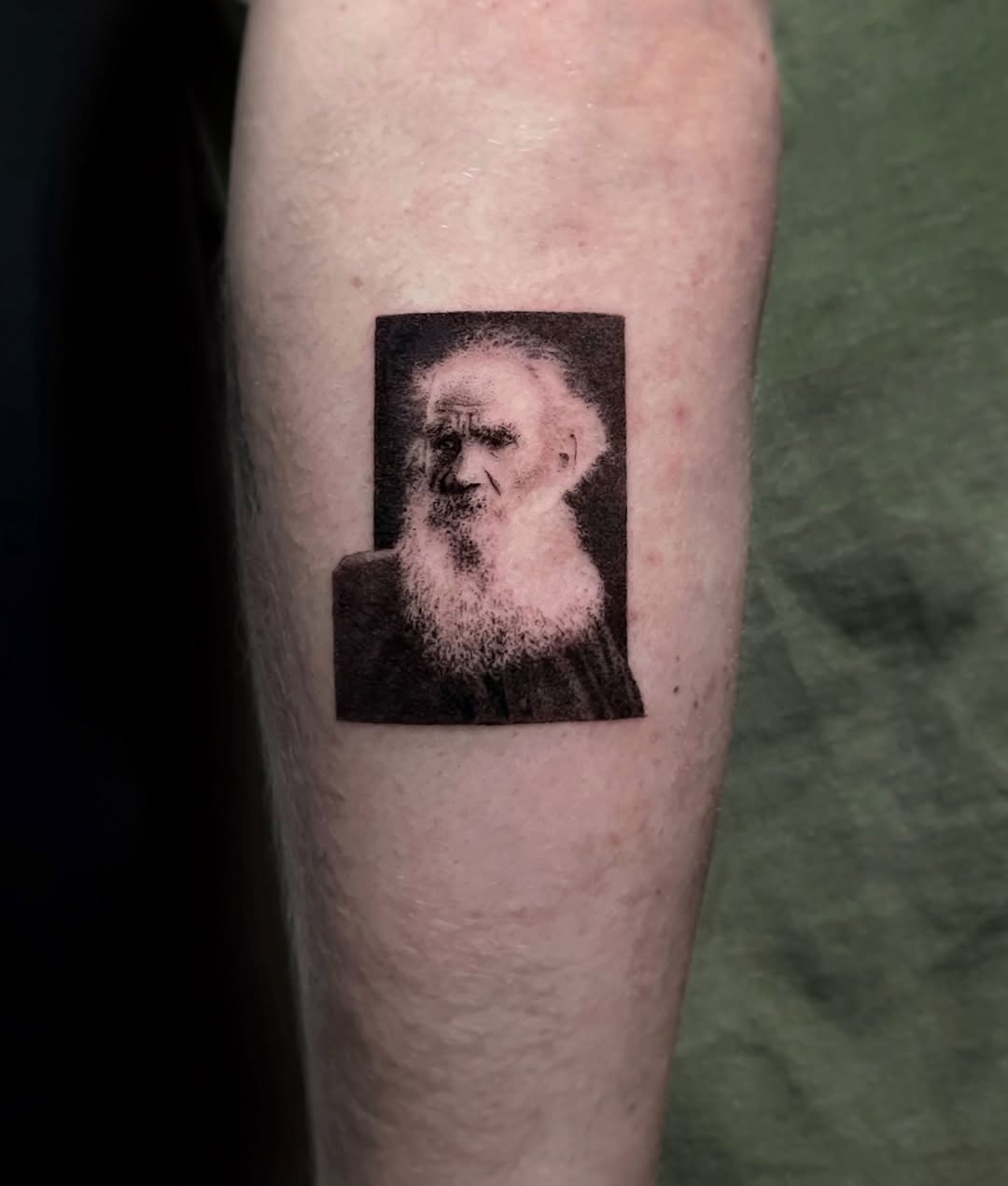 Stunning portrait tattoo of an elderly man