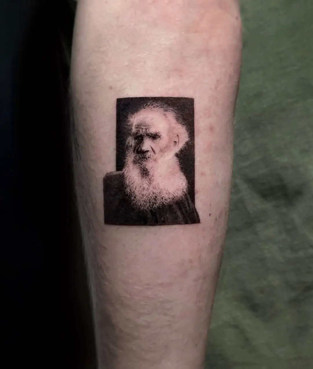 Stunning portrait tattoo of an elderly man