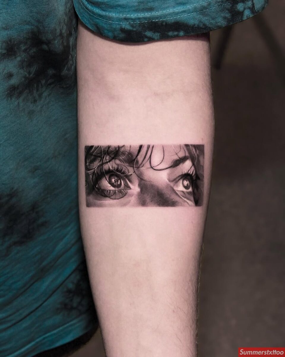Stunning realistic eyes tattoo on forearm