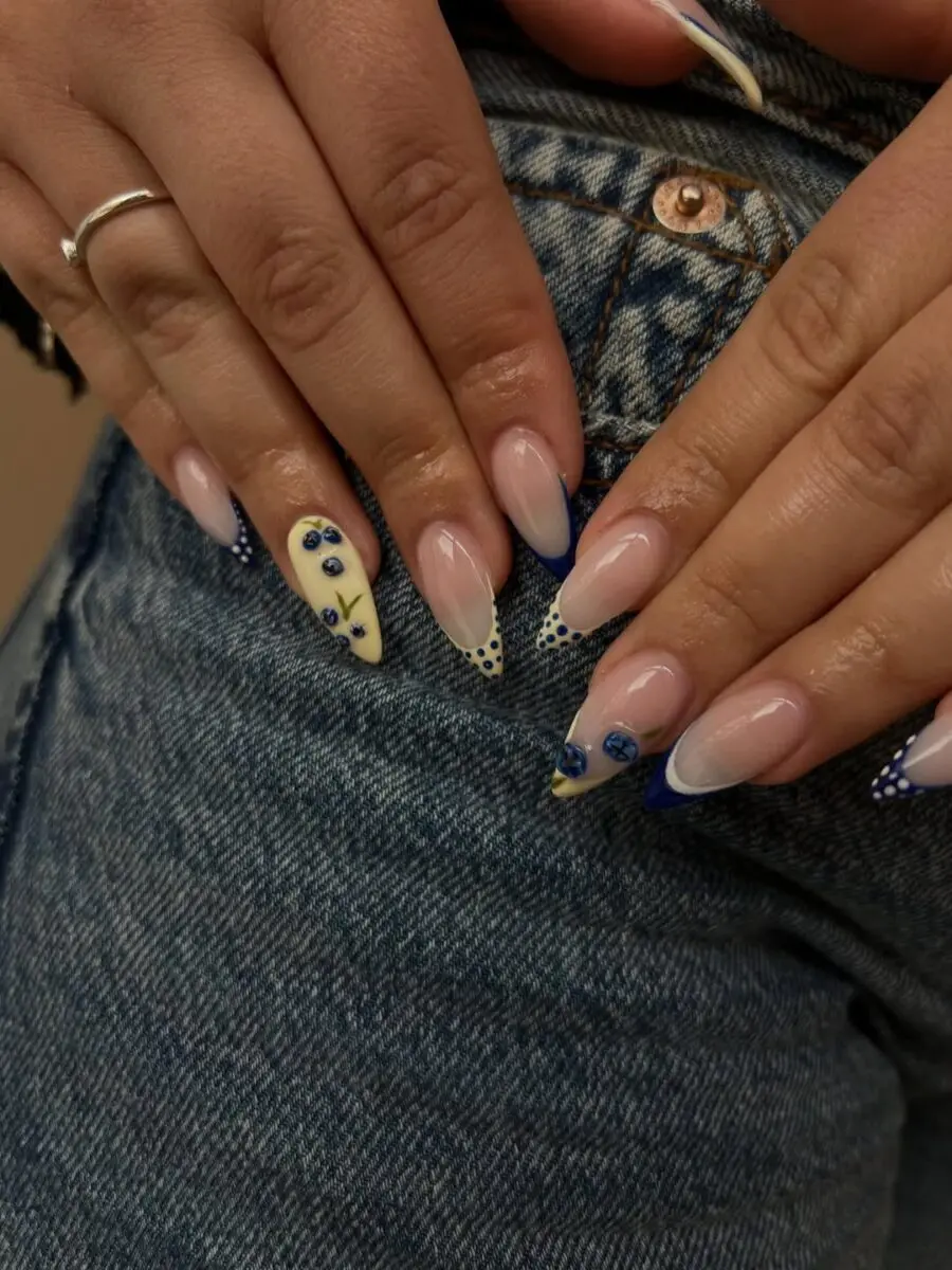 Elegant cream and blue nail design for prom
