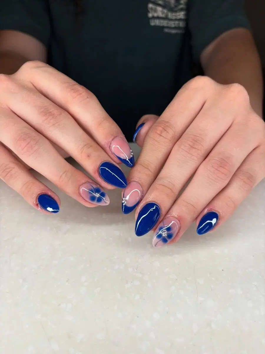 Elegant blue nails with floral accents