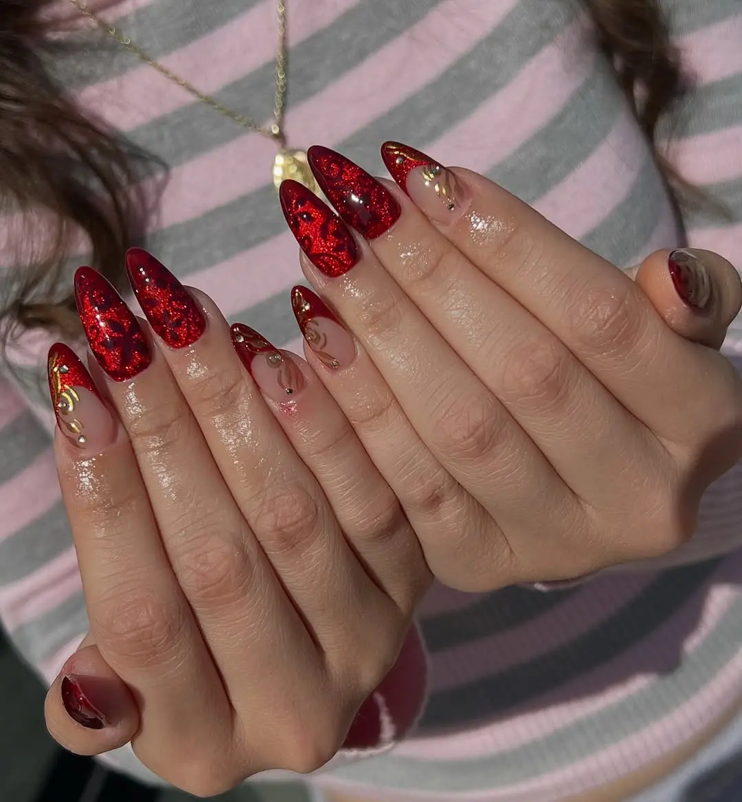Glamorous red glitter and gold nail art