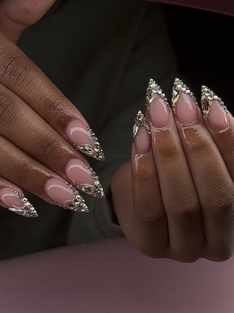 Elegant pink nails with dazzling gemstones