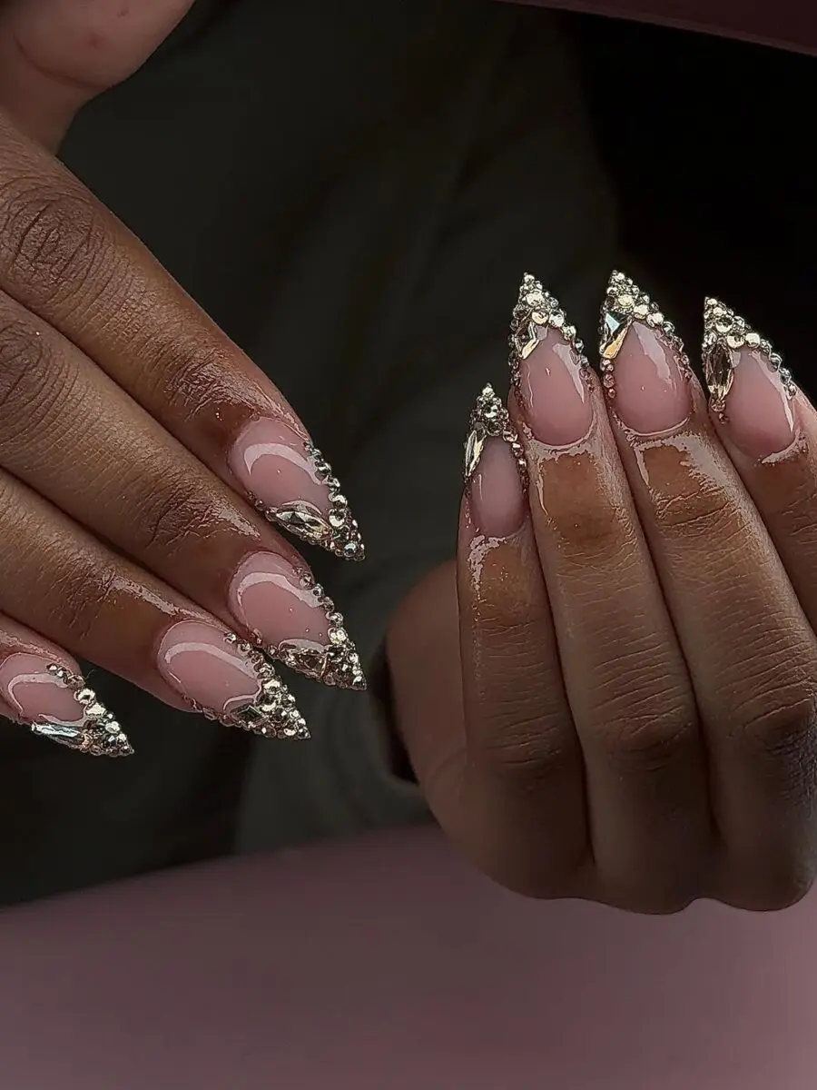 Elegant pink nails with dazzling gemstones